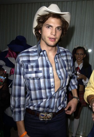 Gwiazdy filmu, TV... - Ashton Kutcher pulled out the cowboy boots for this halloween costume in 2002.jpg